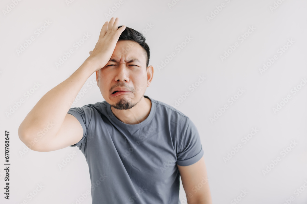 Unpleasant feeling emotion of asian man isolated on white. Depressed and Stress. Unpleasant feeling emotion of asian man isolated on white. Depressed and Stress.