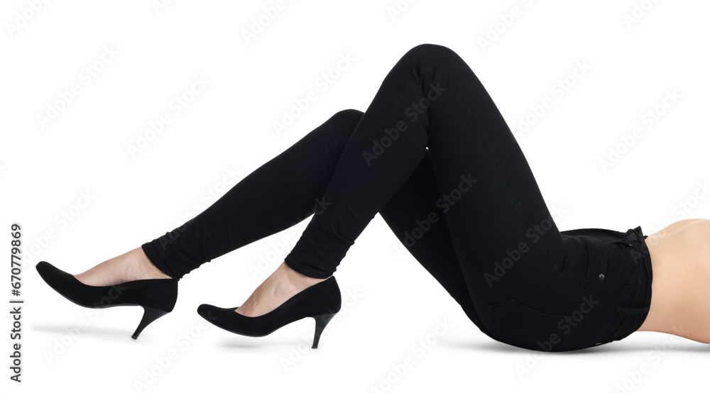 Woman wearing stylish black jeans and high heels shoes on white background, closeup Woman wearing stylish black jeans and high heels shoes on white background, closeup