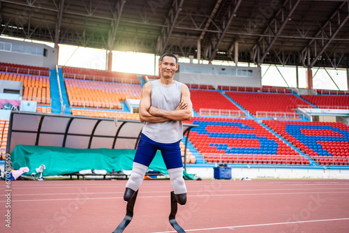 Portrait of Asian para-athletes disabled with prosthetic in stadium.  © Kawee