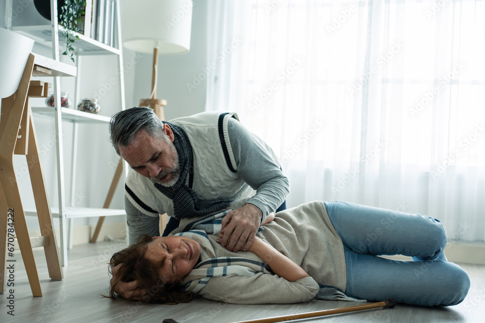 Caucasian senior woman fall on the ground while walk with walker alone. Caucasian senior woman fall on the ground while walk with walker alone.