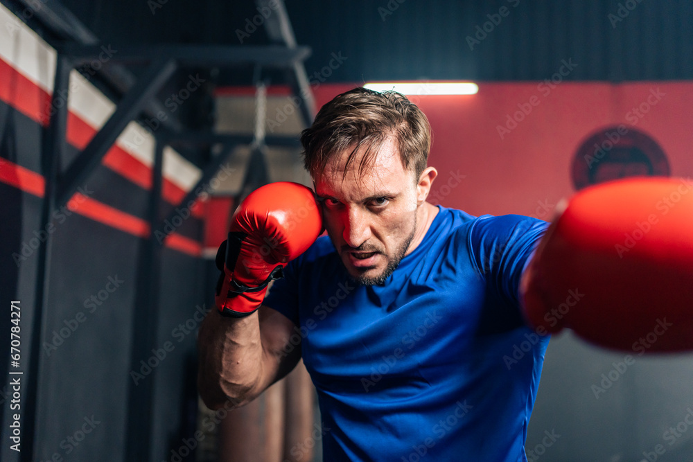 Portrait Caucasian professional sport young man exercising in fitness. 