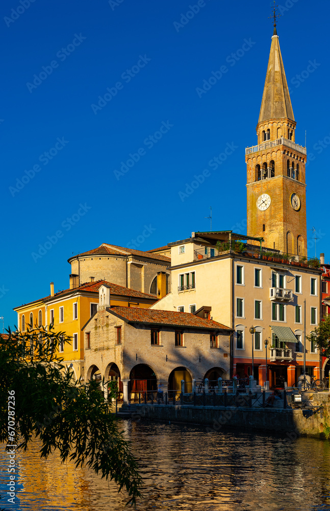 Cityscape of old historical buildings and Lemene river in Portogruaro, Venezia, Veneto, Italy