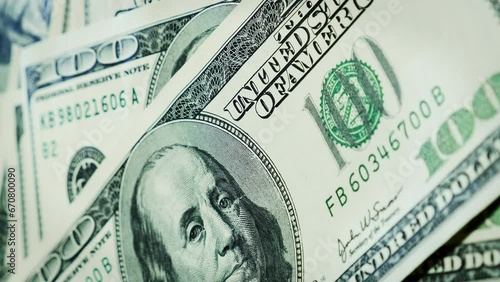 Hundred USD cash dollar banknotes rotating. One hundred dollar. Vertical video