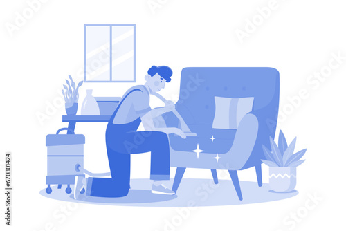 Man Cleaning The Sofa With The Vacuum Cleaner