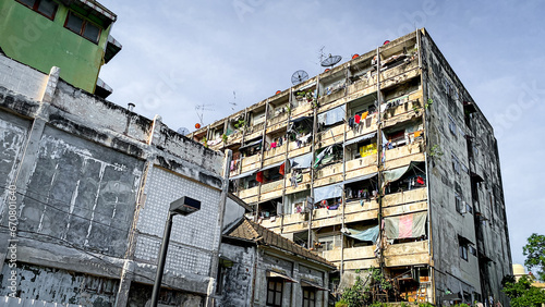 View of poorly maintained apartment Old Building At Chinatown Bangkok Thailand