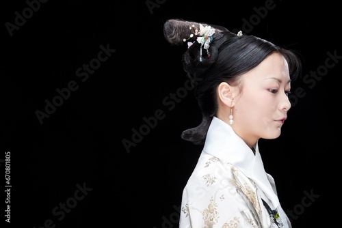 фотографія A Asian woman dressed in Qing Dynasty Empress attire
