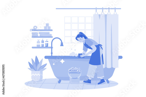 Female Cleaner Is Scrubbing The Bathroom