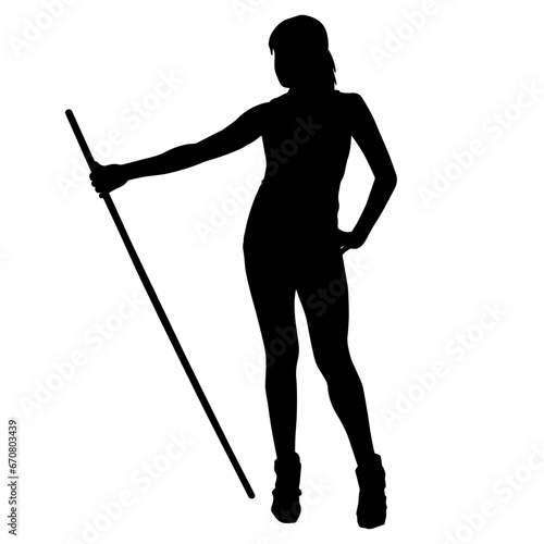 Silhouette of a slim female fighter in standing pose with her staff weapon. A slim woman warrior silhouette carrying toya stick weapon. photo