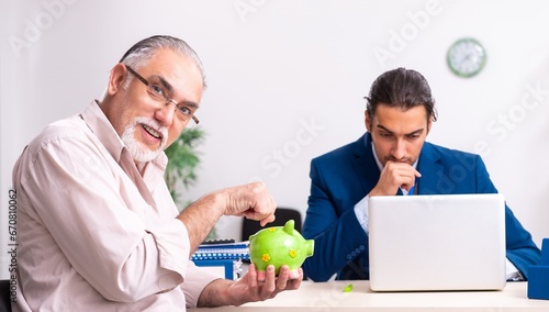 Financial advisor giving retirement advice to old man