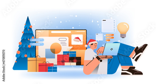 student in santa hat doing homework educational web seminar virtual tutor new year holidays celebration concept