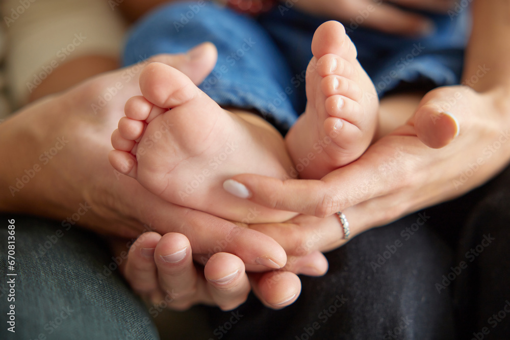 Close up view of baby feet. Mother touching her small child's toes while he is asleep. Baby toe. Newborn close up photography. Tiny beautiful baby's feet. Close up view of baby feet. Mother touching her small child's toes while he is asleep. Baby toe. Newborn close up photography. Tiny beautiful baby's feet.