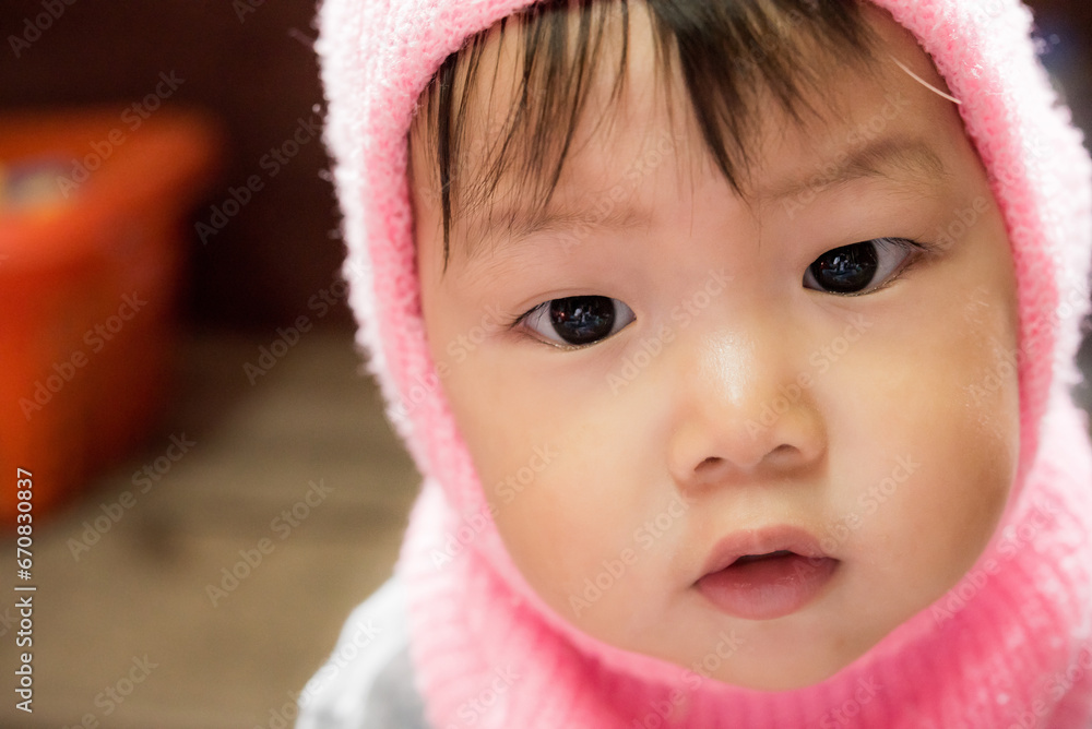 Asian cute little baby in winter hat Asian cute little baby in winter hat