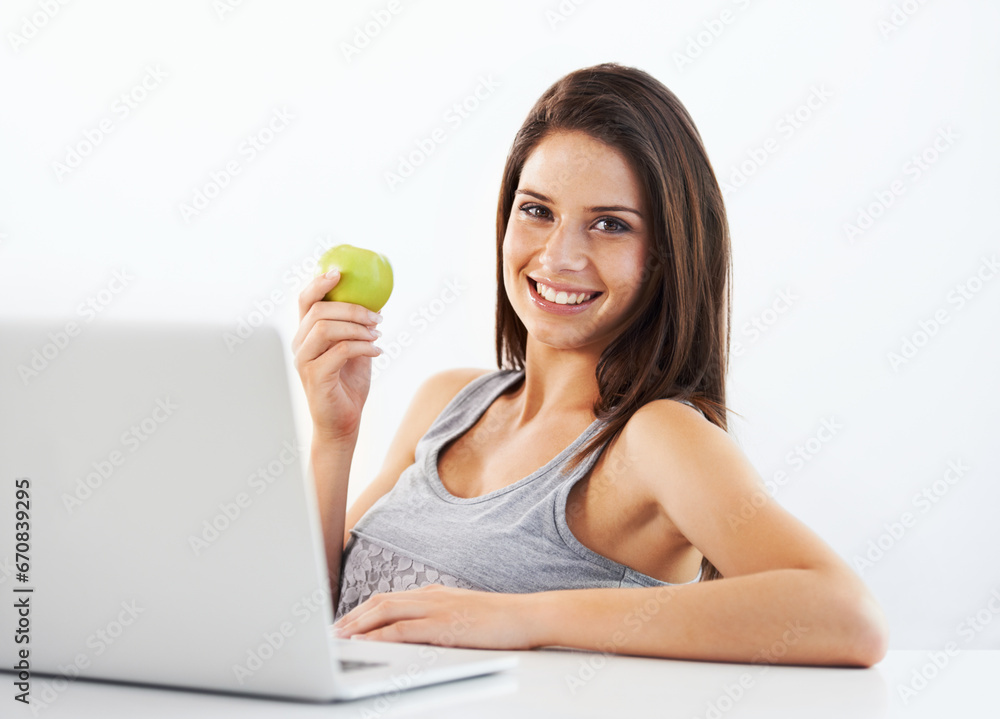 Laptop, portrait and woman nutritionist with apple in studio for wellness, diet or eating plan on white background. Weight loss, face and female health influencer with blog survey, help or menu guide Laptop, portrait and woman nutritionist with apple in studio for wellness, diet or eating plan on white background. Weight loss, face and female health influencer with blog survey, help or menu guide