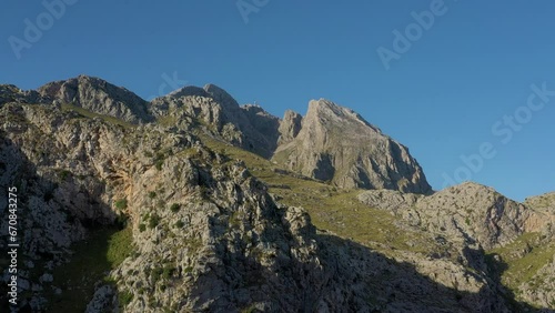 Beautiful aerial drone video of rocky mountains in the north of Mallorca Island in Spain.