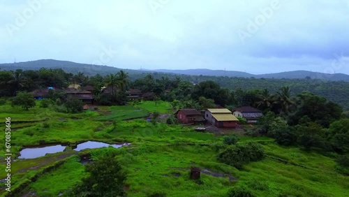 Drone shot of the rural houses of the small town of Lanja in Ratnagiri district, Maharashtra, India photo