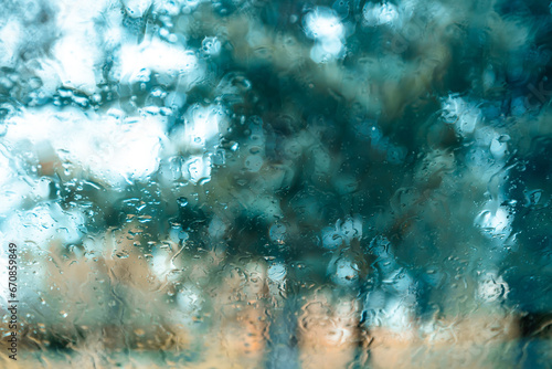 Rain drops on a car windshield - processed colors, shallow DOF