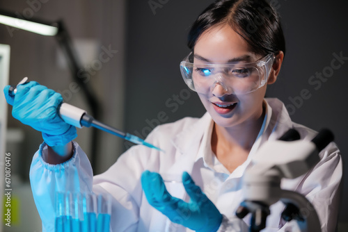 Scientist dropping a sample into a Petri dish