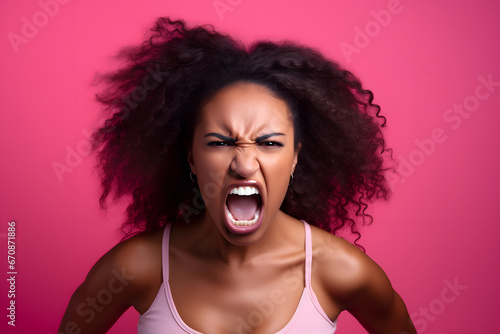 Angry young adult African American woman yelling, head and shoulders portrait on pink background. Neural network generated image. Not based on any actual person or scene. photo
