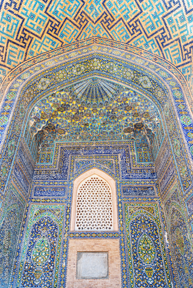Colorful arched niches at courtyard of the Sher-Dor Madrasah