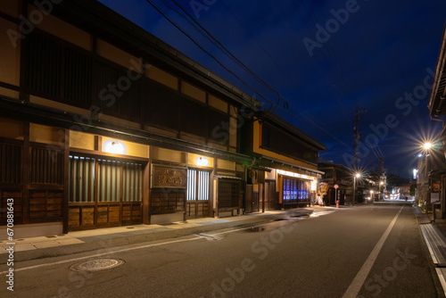 Takayama s historic old town at twilight on night sky. Traditional architecture wooden houses with light up at dusk. Beautiful town in Takayama  Gifu Prefecture  Japan.