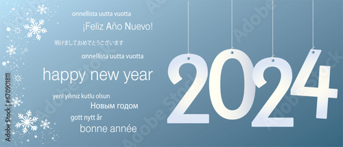 2024 Happy New Year in several languages greeting text on soft gradient background