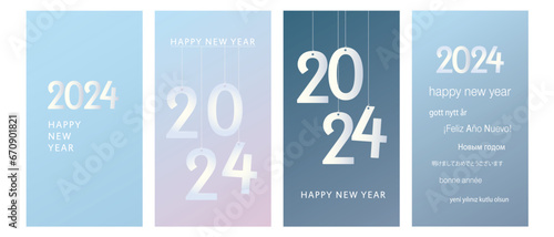 2024 Happy New Year in several languages greeting text on soft gradient background