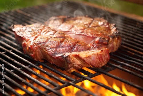 porterhouse steak flipped on a backyard grill