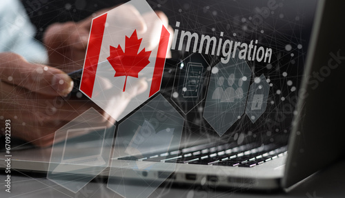 Concept of immigration to Canada with virtual button pressing photo