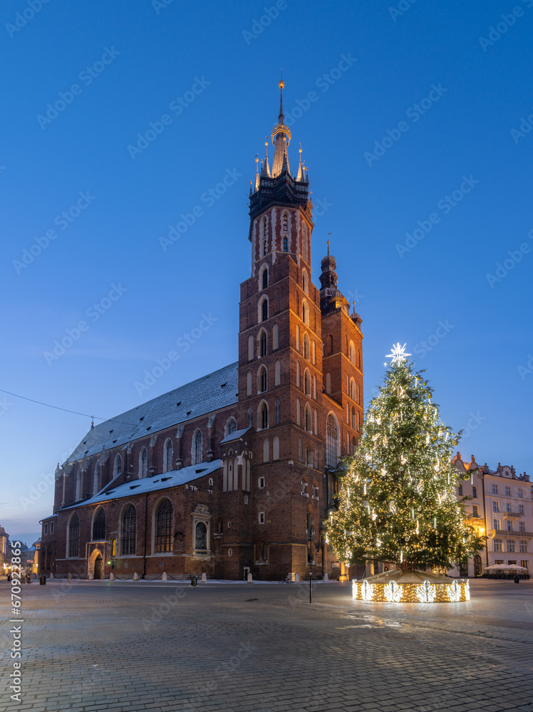St Mary's church on Main Square in winter Krakow, illuminated in the night..