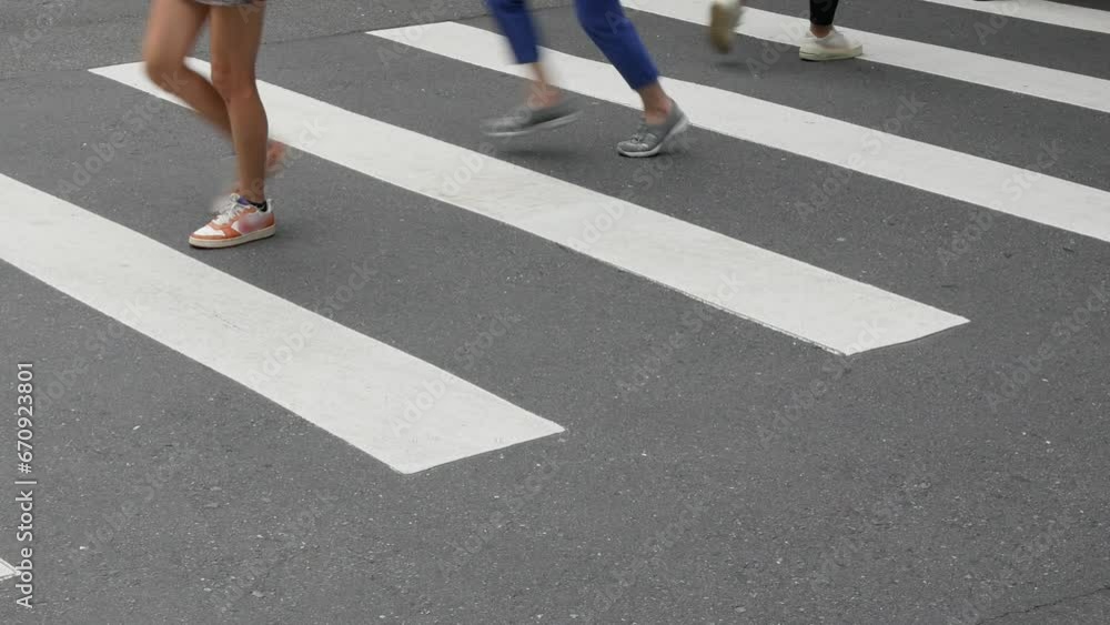 low angle view to the at zebra crossing area at intersection while traffic of motorcycle motorbike passing low angle view to the at zebra crossing area at intersection while traffic of motorcycle motorbike passing