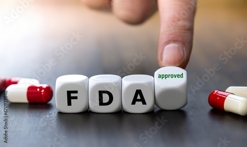 Dice form the expression FDA (Food and Drug Administration) approved. photo