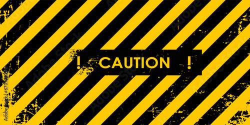 warning sign with black stripes on yellow background.