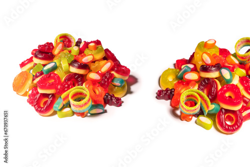 Assorted colorful gummy candies. Top view. Jelly donuts. Jelly bears. Isolated on a white background.