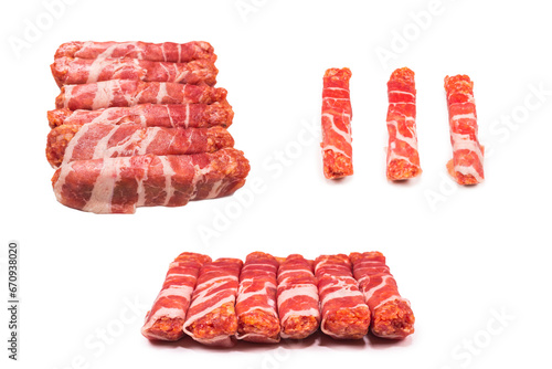 Chevapchichi in bacon isolated on white background. photo