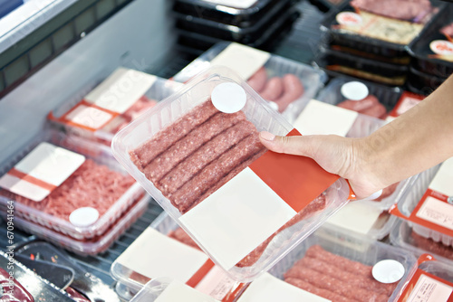 Plastic packaging with pork minced meat photo