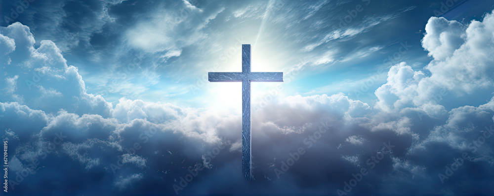 cross in clouds symbol of the death and resurrection , copy space for text.