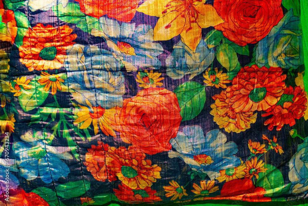 fabric texture,fragment of fabric with colorful flowers, fragment of fabric of a beautiful home pillow