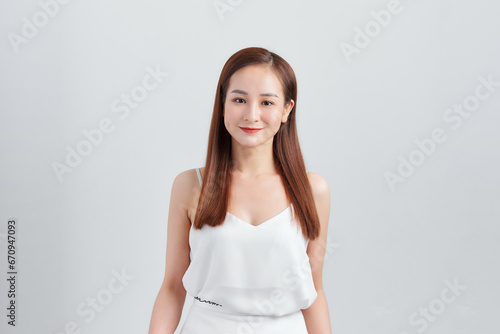 young beautiful asia girl with pretty smile on face