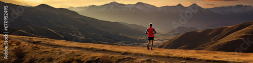 Panoramic illustration of mountain runner surrounded by graduating hills at sunset  © David