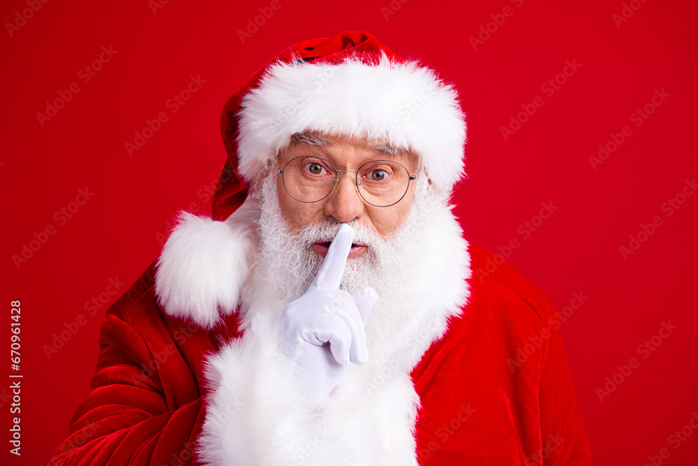 Photo of retired man santa claus wear white gloves hands touch mouth stop talk information news isolated on red color background Photo of retired man santa claus wear white gloves hands touch mouth stop talk information news isolated on red color background