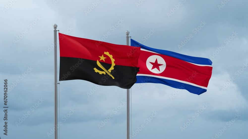 North Korea and Angola flag waving together on cloudy sky, endless seamless loop North Korea and Angola flag waving together on cloudy sky, endless seamless loop
