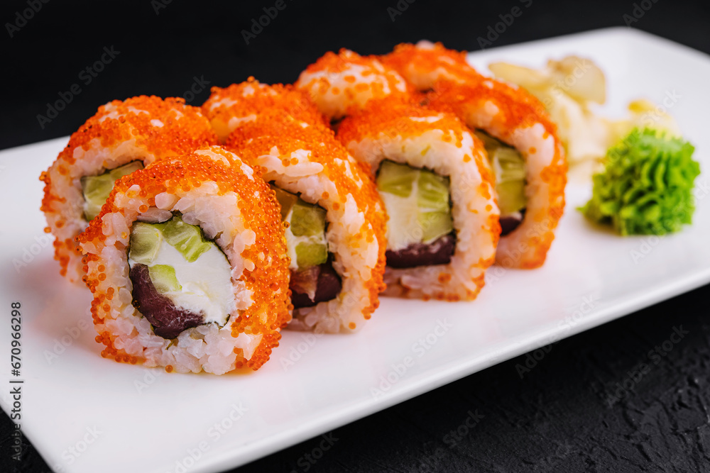 Macro shot of california maki sushi rolls with rice Macro shot of california maki sushi rolls with rice
