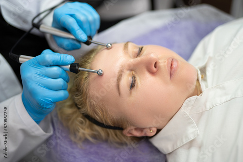close-up of a girl's face at a cosmetologist during treatment procedures