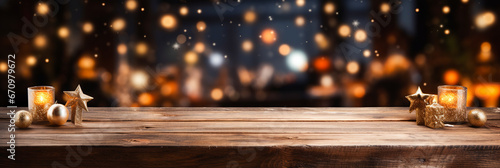 Empty wooden table for product display montages with christmas decorations and bokeh background 