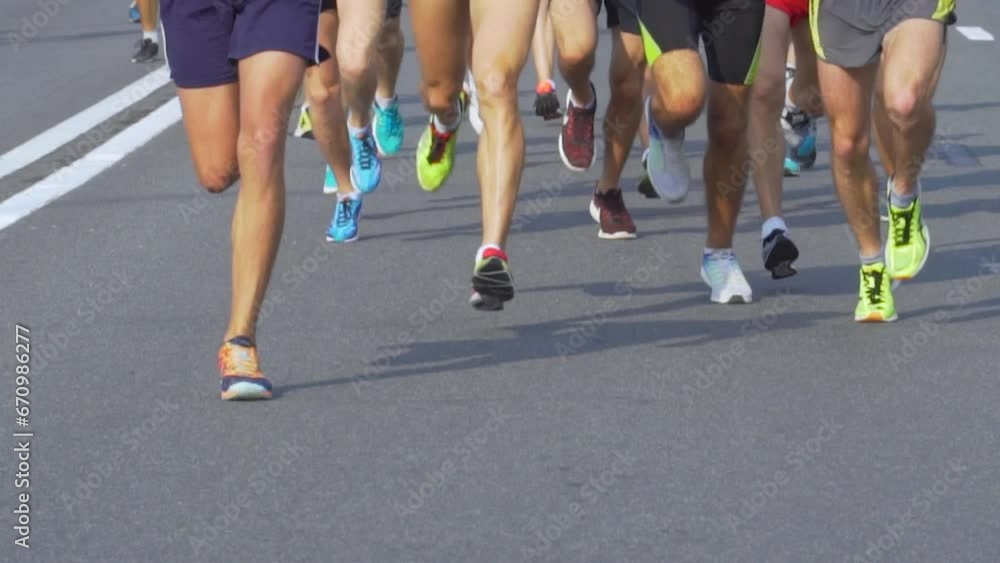 Urban Half Marathon in Minsk, Belarus. Runners Legs Close Up. Slow Motion Urban Half Marathon in Minsk, Belarus. Runners Legs Close Up. Slow Motion