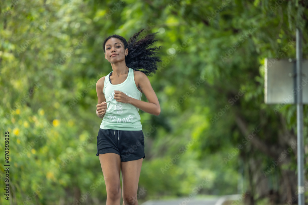 Stylish female runners in modern attire, discover serenity. Reenergize amid jogging the parkway. Stylish female runners in modern attire, discover serenity. Reenergize amid jogging the parkway.