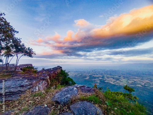 This breathtaking landscape photograph captures the serene beauty of the mountains, the expanse of the sky, and the tranquility of nature in Chaiyaphum City, Thailand. photo