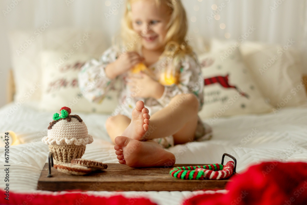 Beautiful children, blond kids, siblings, playing in decorated home for Christmas, enjoying holidays
