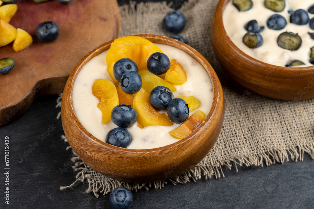 ripe blueberries and fresh creamy yogurt ripe blueberries and fresh creamy yogurt