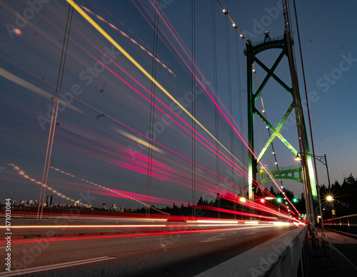 Traffic going over the Lions Gate Bridge in Vancouver, Canada. photo
